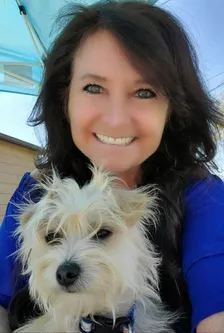 Laurie with pets — founder of Critter Care